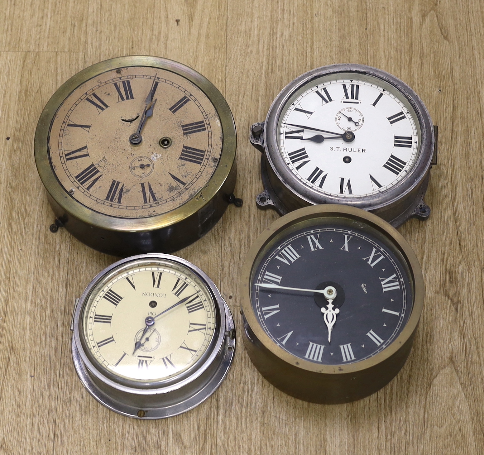 Four bulkhead timepieces